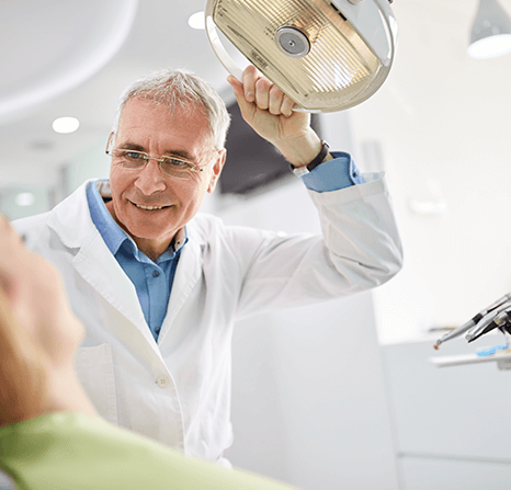 Patient getting her tooth looked at